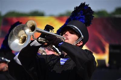 Close-up shot of a band member playing during the show.